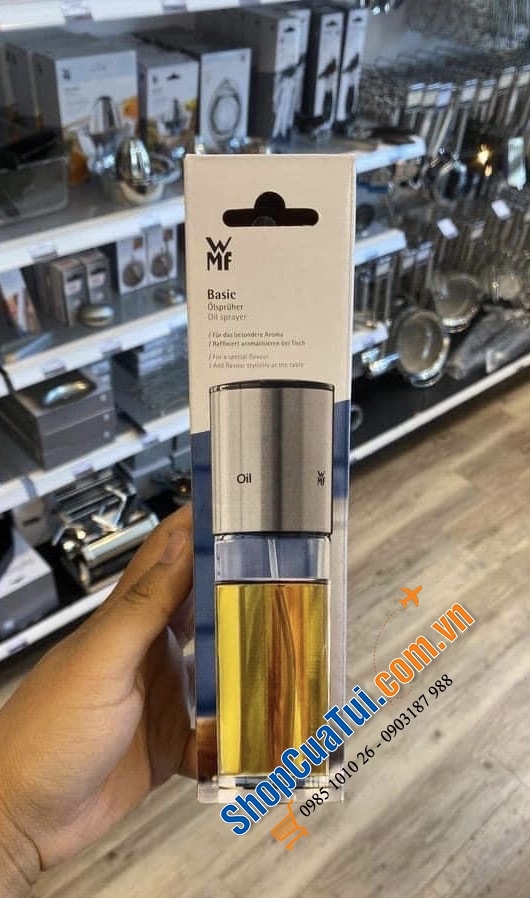 Bình xịt dầu giấm wmf mẫu mới tinh đặt lên bàn tiệc siêu sang.