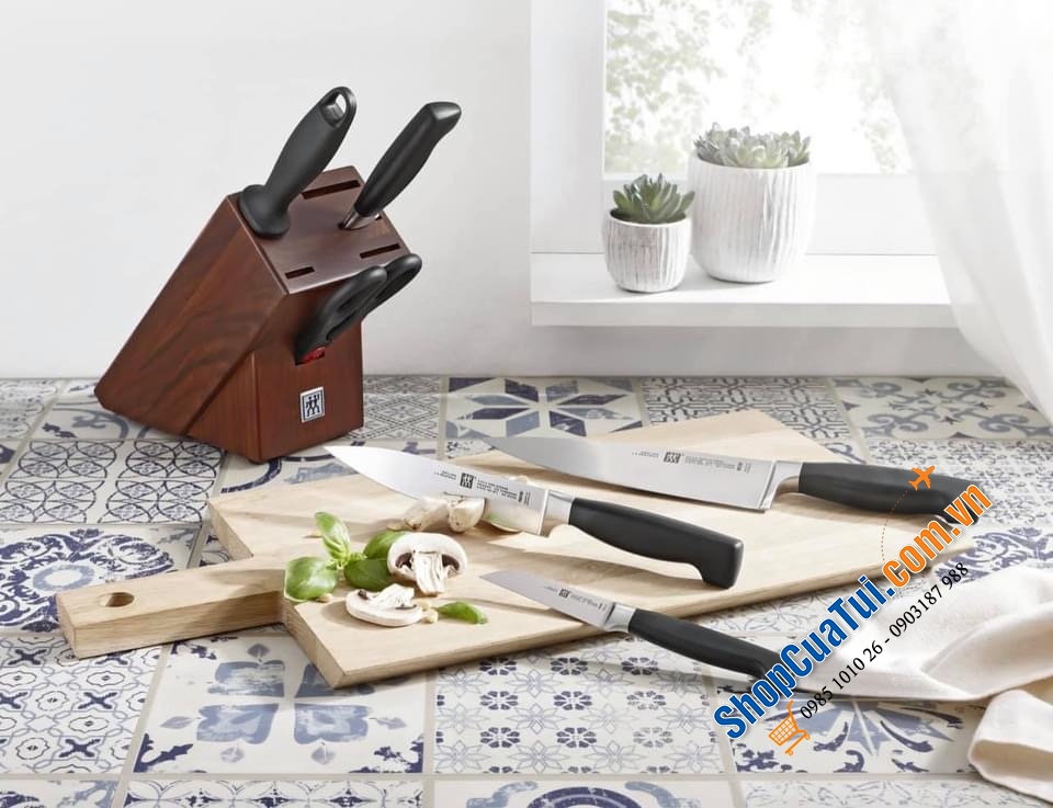 Bộ dao Zwilling Vier Sterne Four Star 7 món - Đốc gỗ óc chó nâu tự nhiên -  thuộc dòng dao đắt nhất hiện nay của Zwilling danh giá đc sx tại Đức.